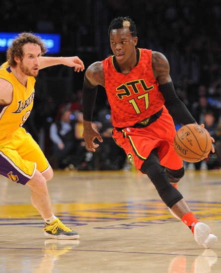 March 4, 2016; Los Angeles, CA, USA; Atlanta Hawks guard Dennis Schroder (17) moves the ball against Los Angeles Lakers guard Marcelo Huertas (9) during the second half at Staples Center. Mandatory Credit: Gary A. Vasquez-USA TODAY Sports